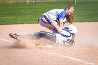 LCHS SS Haley Loffer misses the tag by CHS 3B Mariah Montee