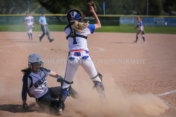 Vikings Catcher Abby Howard makes the play at the plate to head